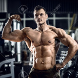 73427297-portrait-bodybuilder-in-gym-horizontal-photo