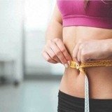Woman-measuring-stomach-1296x728